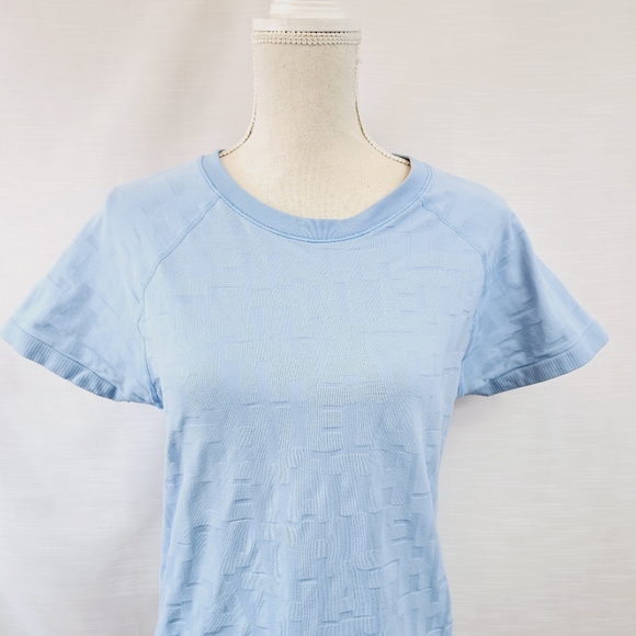 Athleta Allover Graphic Seamless Running Tee size Large - Picture 2 of 8